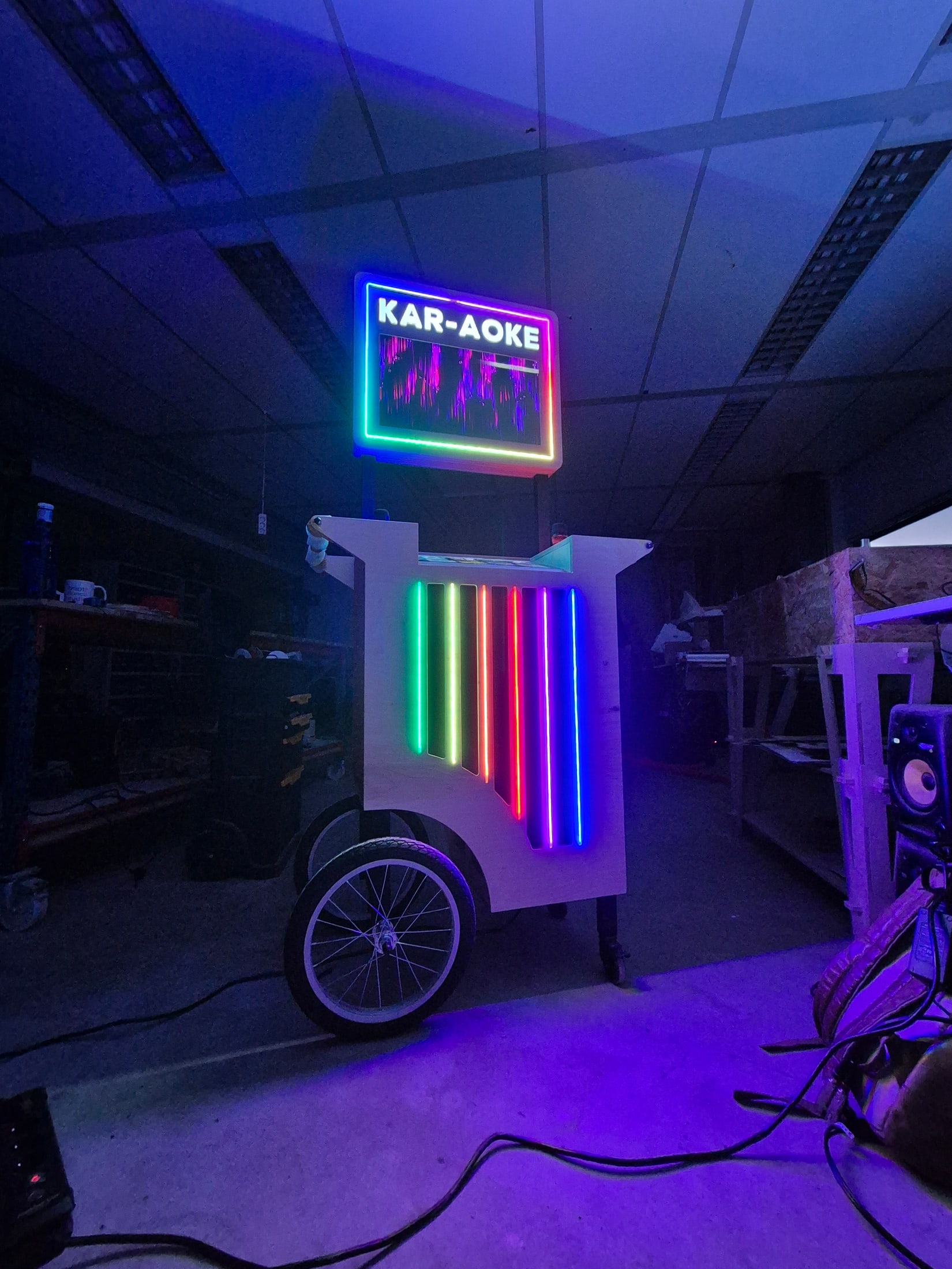 Kar-aoke cart illuminated in the workshop with its full LED equaliser visible