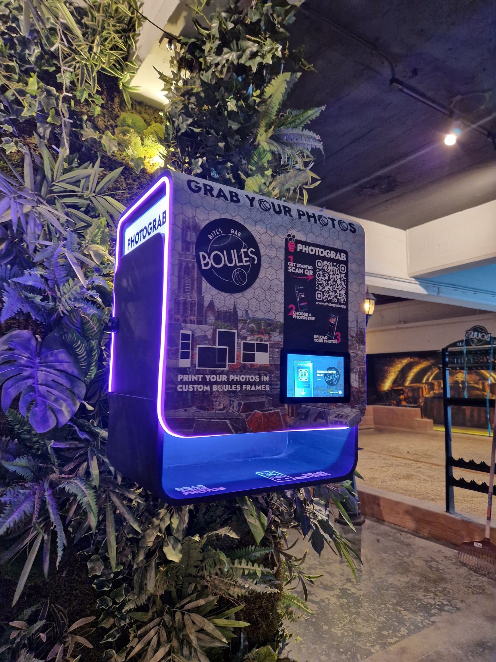 PHOTOGRAB station integrated into a branded indoor event environment