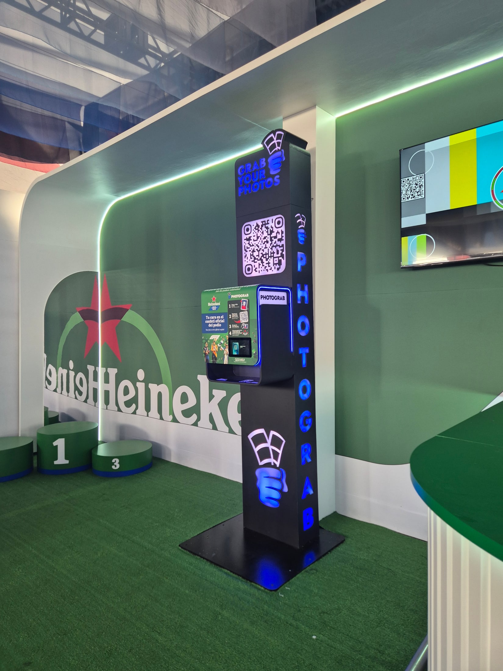 PHOTOGRAB capture and print station inside a branded event environment