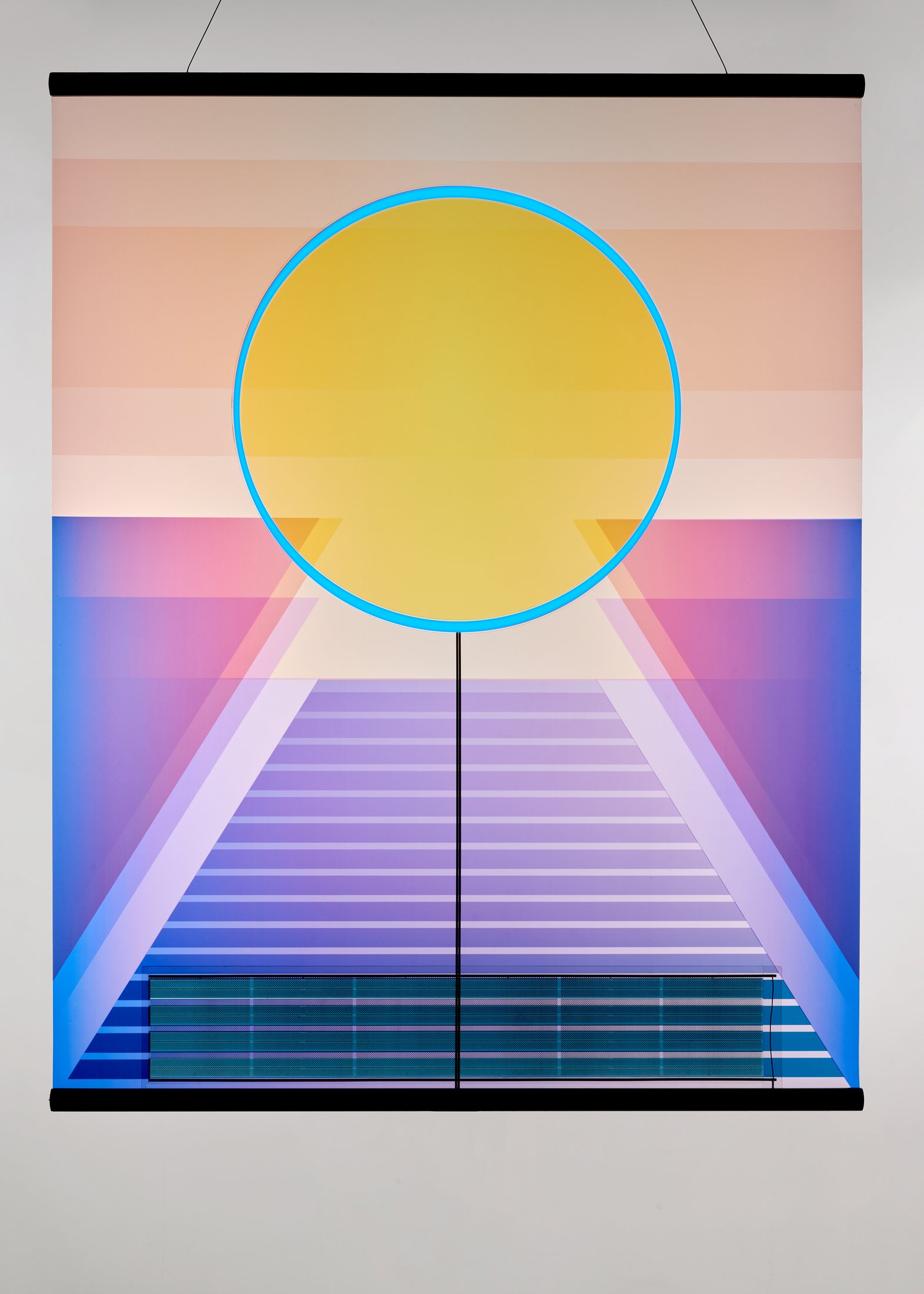 Close view of RA's illuminated yellow circle and geometric solar textile