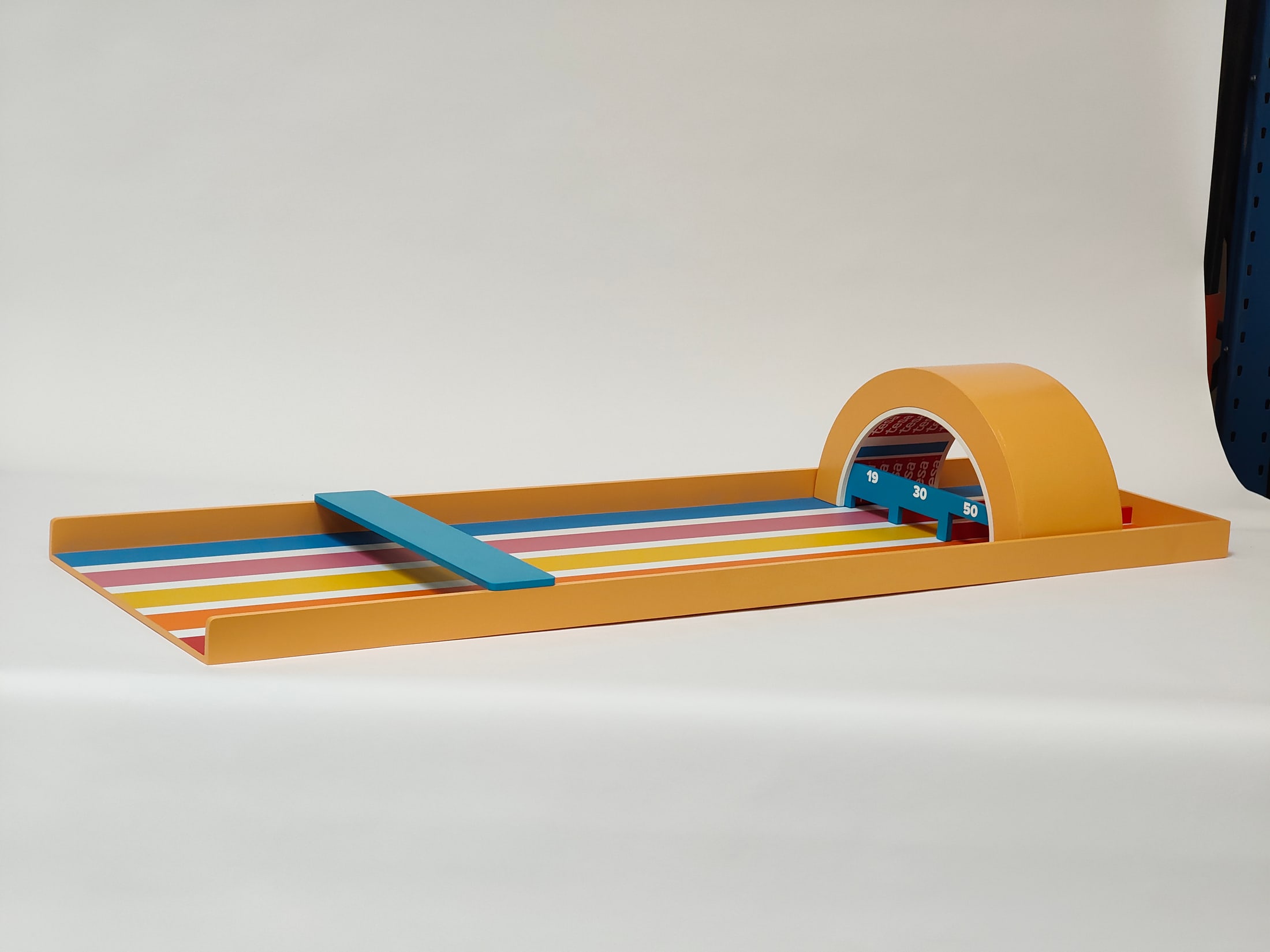 Clean full-length view of the Tesa shuffleboard before play