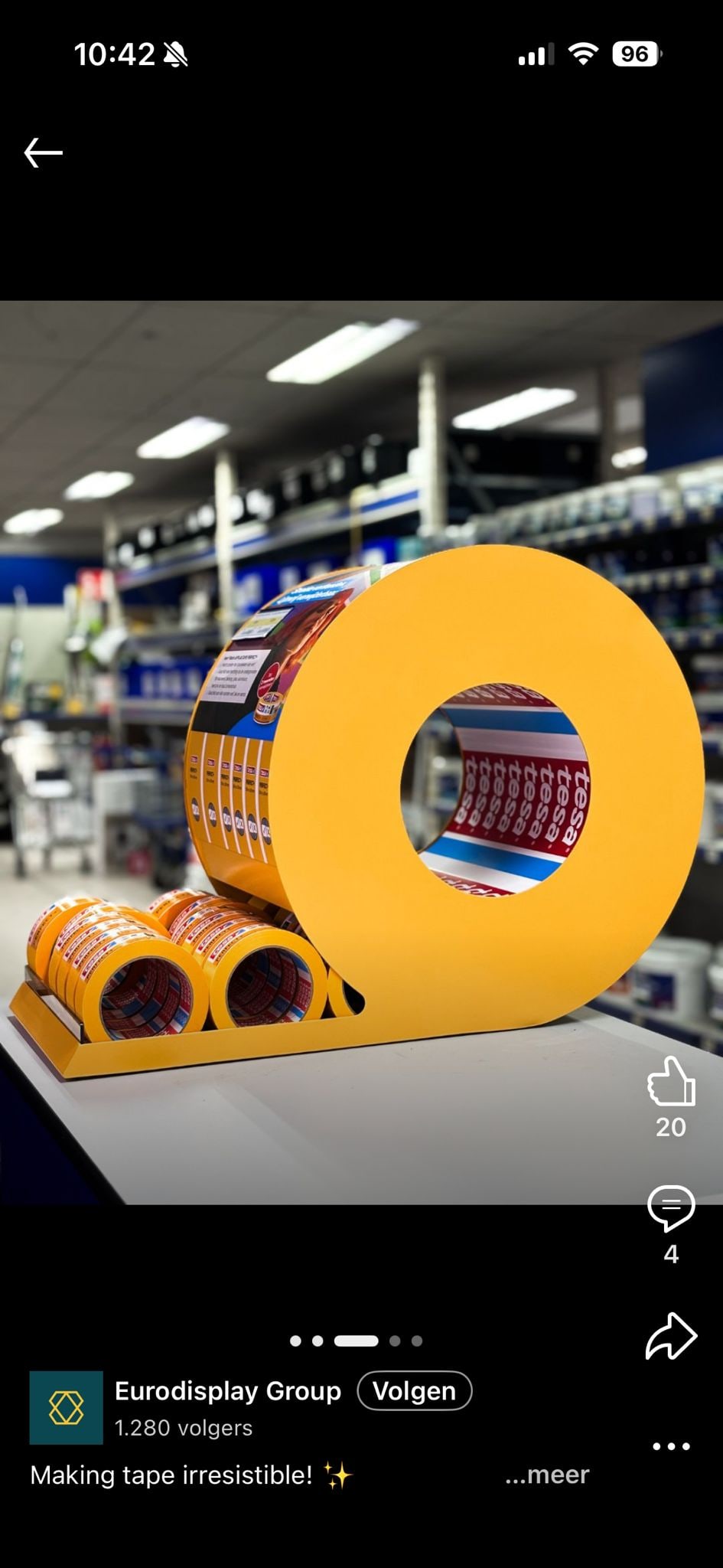 Full Tesa tape dispenser display with its circular side profile