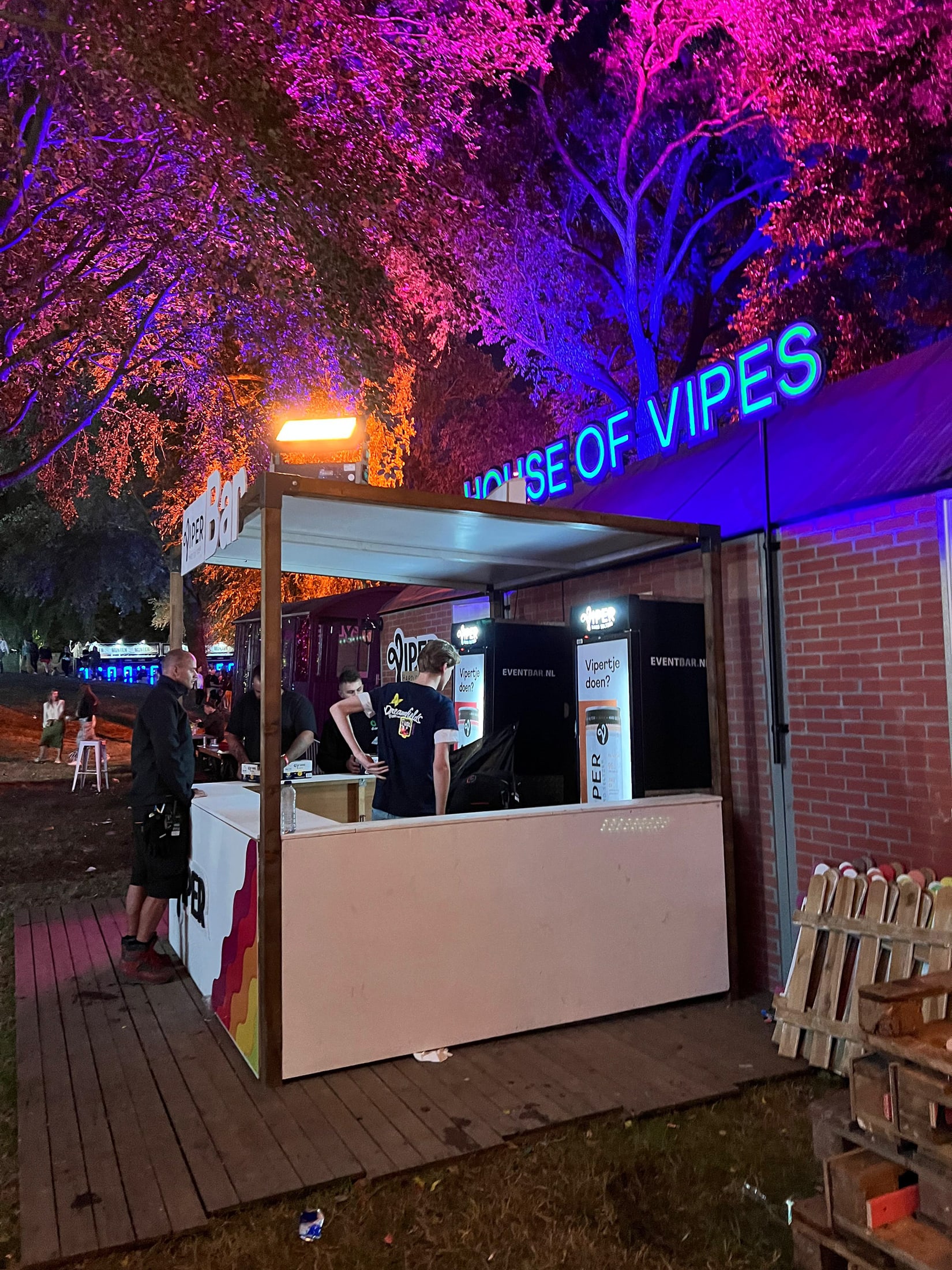 House of Vipes entrance glowing at night during the festival